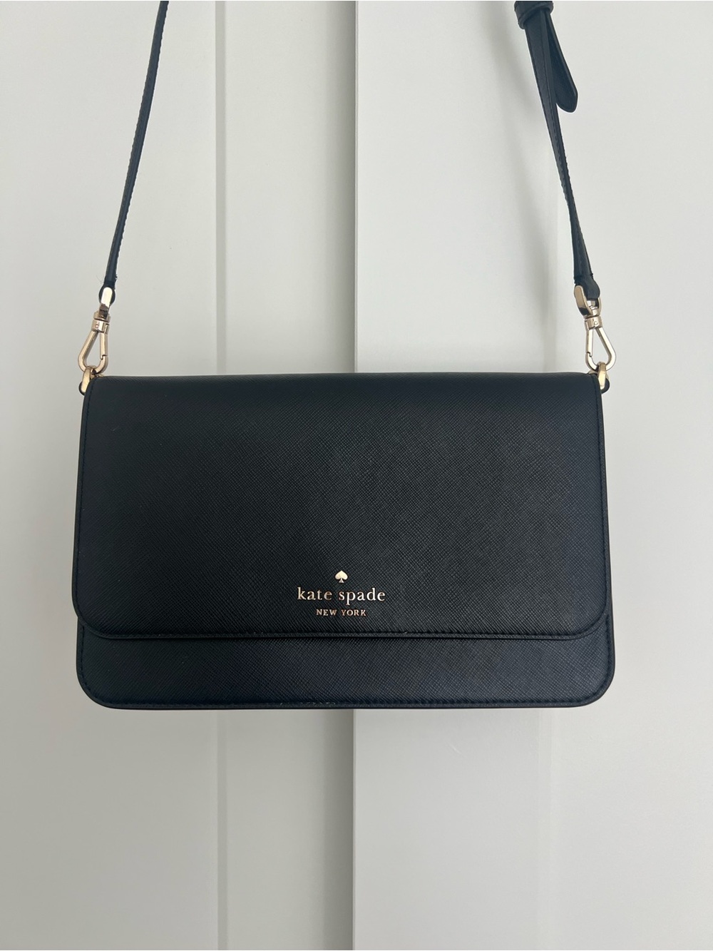 Kate Spade black leather flap crossbody with gold hardware